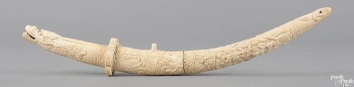 Finely carved Japanese ivory sword, late 19th c., with a dragon head grip