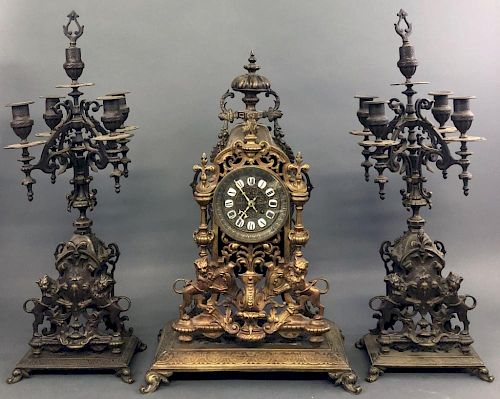 French Bronze and Metal Clock and Garniture Set
