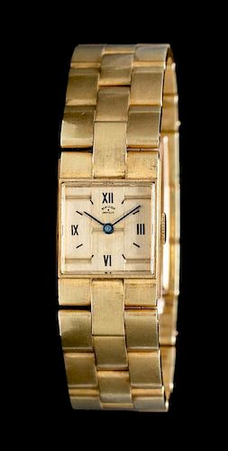 * An 18 Karat Yellow Gold Wristwatch, Van Cleef & Arpels,