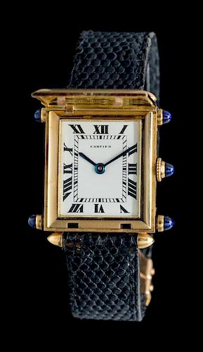 * An 18 Karat Yellow Gold 'Tank Obus Savonette' Hunter Case Wristwatch, Cartier, Circa 1937,