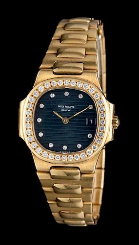 An 18 Karat Yellow Gold and Diamond Ref. 4700/003 'Nautilus' Wristwatch, Patek Philippe,