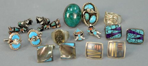 Silver lot including five pairs of cufflinks, three rings, pair of pins, and gold and silver ring. 4.7 total t. oz.