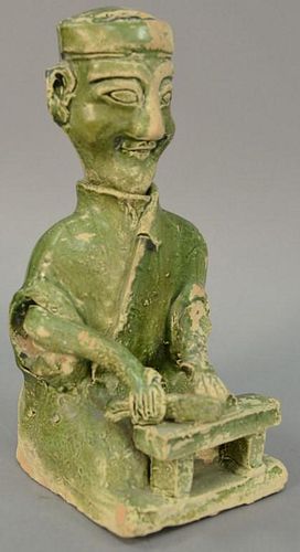 Chinese green glazed figure of a seated banquet chef. ht. 10 3/4in.