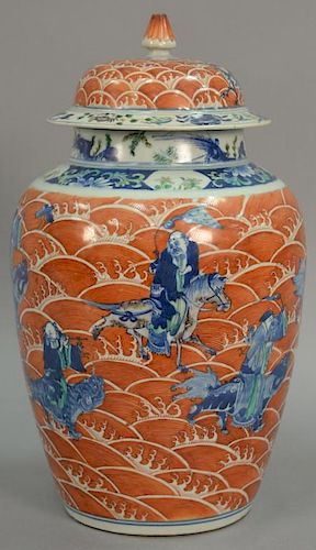 Large Chinese porcelain covered jar having painted scholars riding animals and mythical creatures amongst red flaming clouds