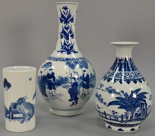 Three Chinese blue and white porcelain vases to include a sleeve form cylindrical vase, Yuhuchunping pear shaped vase, and a