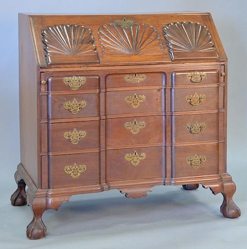Centennial Chippendale mahogany desk having carved slant front over four block front drawers, on ball and claw feet, circa 18