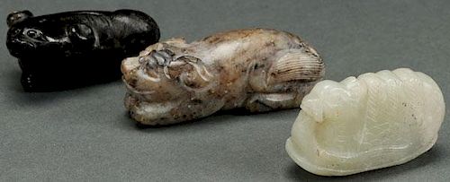 A GROUP OF THREE CHINESE CARVED JADE FIGURES