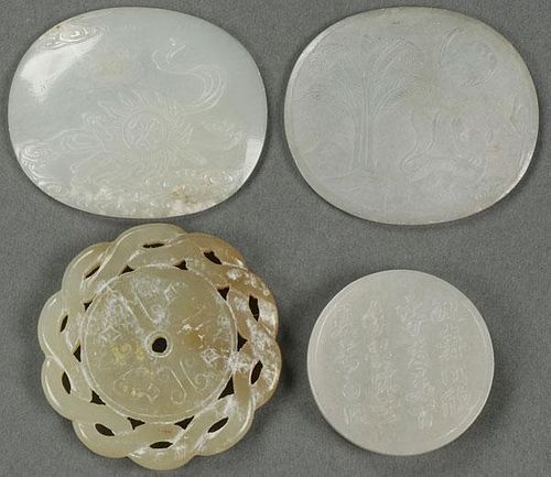 A GROUP OF FOUR CHINESE CARVED JADE ORNAMENTS