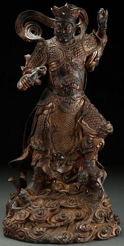 A LARGE CHINESE BRONZE FIGURE