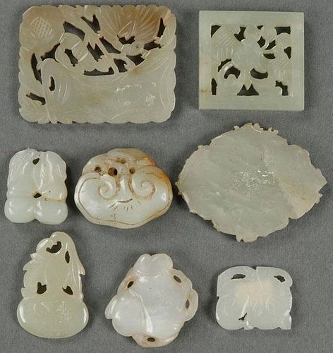 A GROUP OF EIGHT CHINESE CARVED WHITE JADE