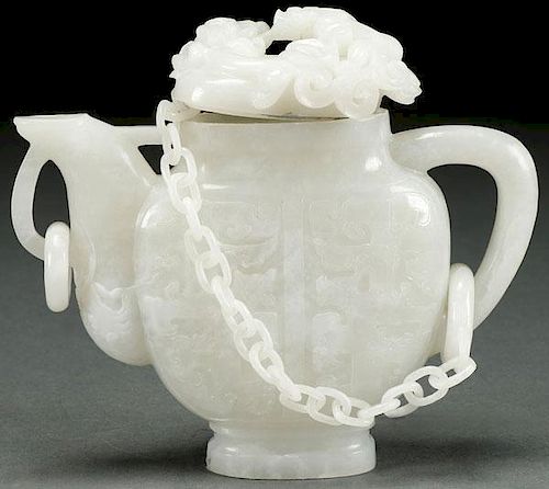 A CHINESE CARVED WHITE JADE ORNAMENTAL TEAPOT