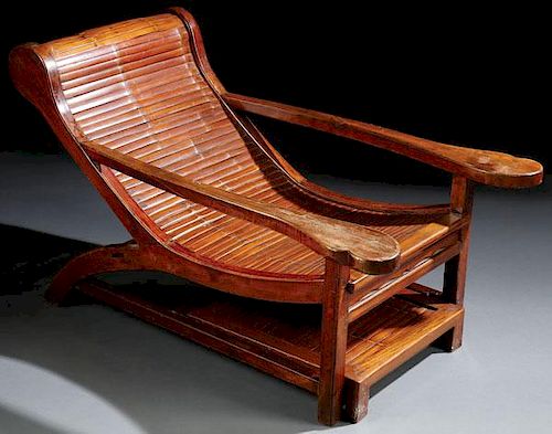 A CHINESE HARDWOOD AND BAMBOO PROMENADE CHAIR