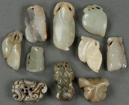 A GROUP OF TEN CHINESE CARVED JADE ORNAMENTS