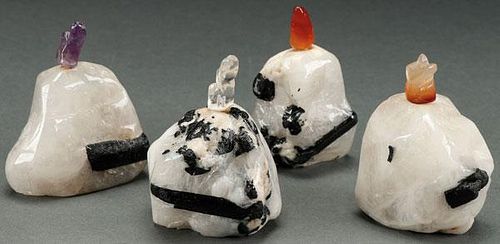 A GROUP OF FOUR CHINESE CARVED BLACK TOURMALINE