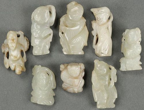 A GROUP OF EIGHT CHINESE CARVED WHITE JADE