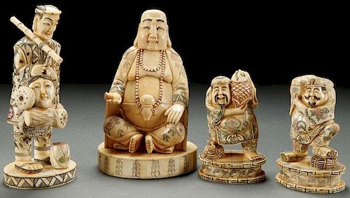 A GROUP OF FOUR CHINESE CARVED BONE FIGURES