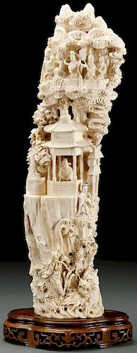 AN IMPRESSIVE CHINESE CARVED IVORY FIGURAL GROUP
