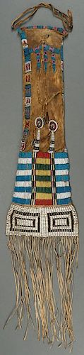 A PLAINS BEADED HIDE PIPE-BAG, PROBABLY CHEYENNE
