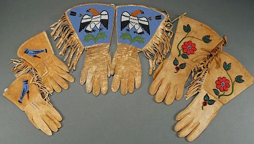 A GROUP OF THREE PLATEAU BEADED GAUNTLETS