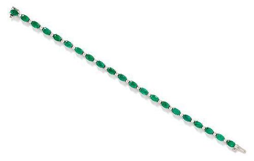 A 14 Karat White Gold, Emerald and Diamond Bracelet, 9.00 dwts.