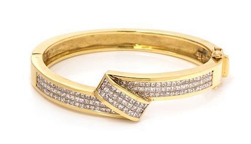An 18 Karat Yellow Gold and Diamond Bangle Bracelet, 36.10 dwts.