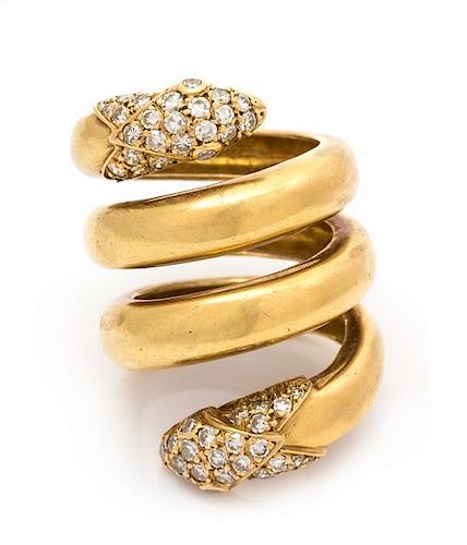 An 18 Karat Yellow Gold and Diamond Double-Headed Serpent Spiral Ring, Christian Dior, 11.80 dwts.