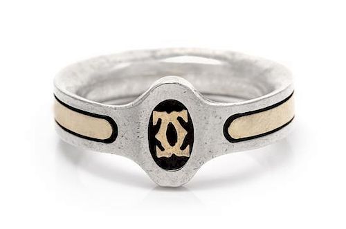 A Sterling Silver and 18 Karat Yellow Gold Ring, Cartier, 4.30 dwts.