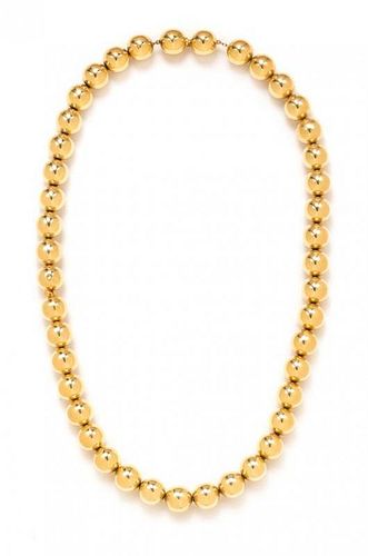 * An 18 Karat Yellow Gold Bead Necklace, 45.00 dwts.