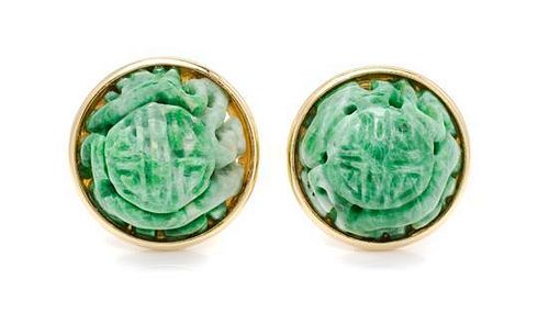 * A Pair of 18 Karat Yellow Gold and Carved Jade Earclips, 15.90 dwts.
