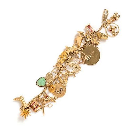 A 14 Karat Yellow Gold Bracelet with 25 Attached Charms, 51.10 dwts.