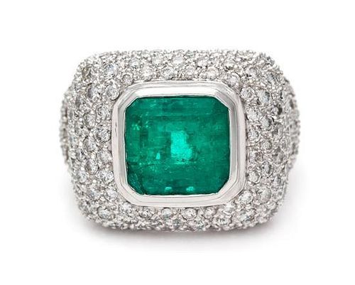 A White Gold, Emerald and Diamond Ring, 10.30 dwts.