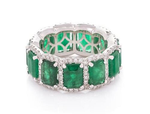 A White Gold, Emerald and Diamond Eternity Band, 6.10 dwts.