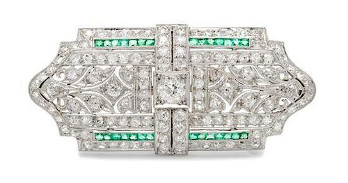 An Art Deco, Platinum, Diamond and Emerald Brooch, 7.60 dwts.