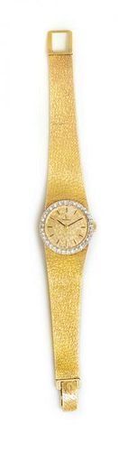 A 14 Karat Yellow Gold and Diamond Wristwatch, Omega, 26.40 dwts.