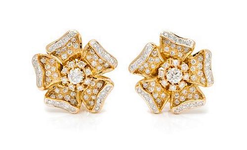 * A Pair of 18 Karat Yellow Gold and Diamond Earrings, 10.50 dwts.