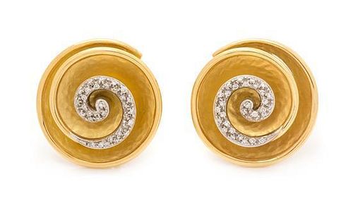 * A Pair of 18 Karat Bicolor Gold and Diamond Earclips, Italian, 13.20 dwts.