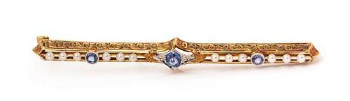 An Edwardian Platinum Topped 14 Karat Yellow Gold, Sapphire and Seed Pearl Bar Brooch, 2.80 dwts.