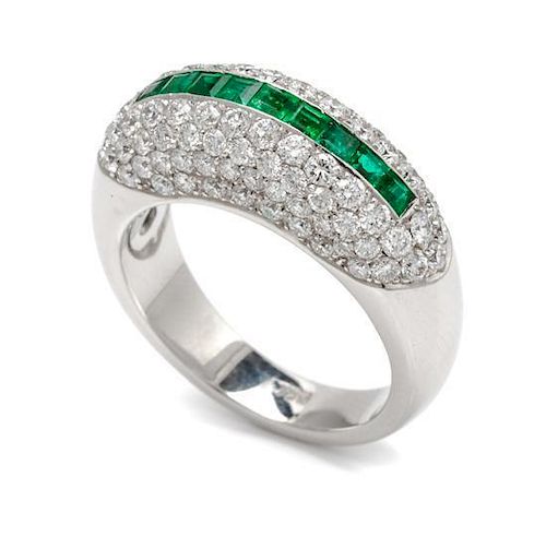 An 18 Karat White Gold, Emerald and Diamond Ring, 5.60 dwts.