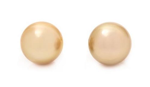A Pair of 14 Karat Yellow Gold and Cultured Golden South Sea Earclips, 8.80 dwts.