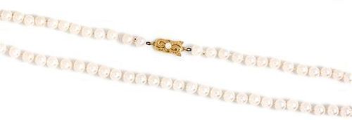 An 18 Karat Yellow Gold and Cultured Pearl Necklace, Mikimoto,