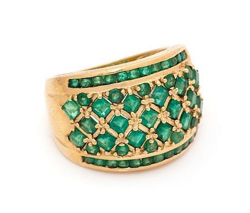 A 14 Karat Yellow Gold and Emerald Ring, 8.40 dwts.