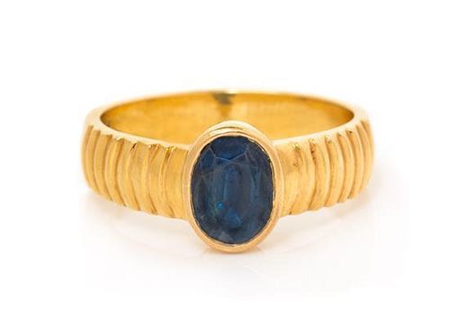 A 22 Karat Yellow Gold and Sapphire Ring, 6.30 dwts.