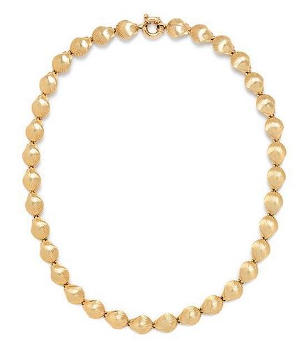 * A 14 Karat Yellow Gold Clam Shell Necklace, 28.50 dwts.