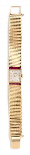 A 14 Karat Yellow Gold and Ruby Wristwatch, Concord, 24.20 dwts.