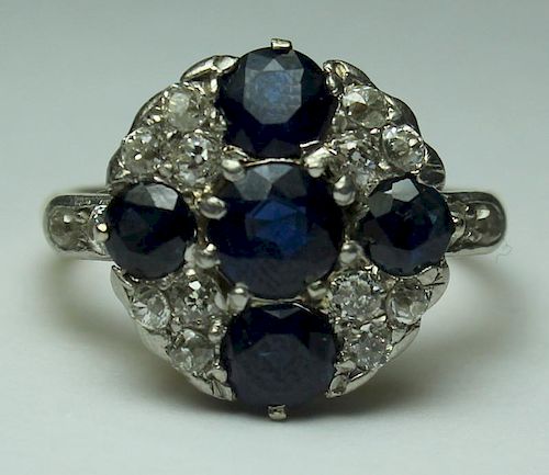 JEWELRY. Sapphire and Diamond Cluster Ring.