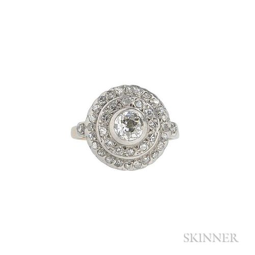 Gold and Diamond Ring, bezel-set with a circular-cut diamond framed by single-cut diamond melee, size 6.