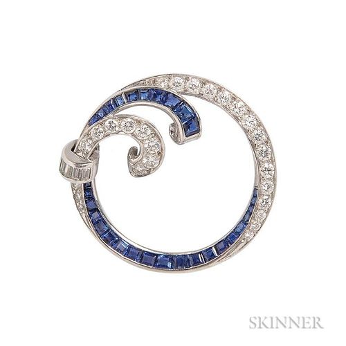 Platinum, Diamond, and Sapphire Brooch, designed as a circle with channel-set sapphires and bead- and channel-set baguette an
