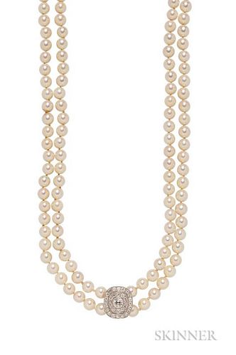 Cultured Pearl and Diamond Necklace, the Art Deco plaque centering an old mine-cut diamond weighing approx. 0.90 cts., framed