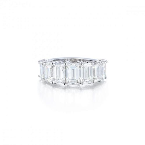 A Seven Emerald-Cut Diamond Ring, with a GIA Report