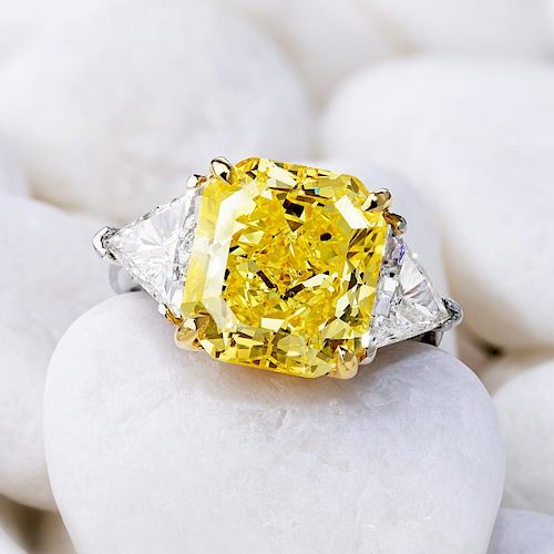 A 7.65-Carat Fancy Vivid Yellow Diamond Ring, with a GIA Report